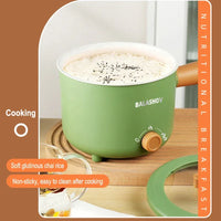 Close-up of the electric pot heating element and inner cooking surface.