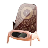 Wireless phone charger displayed with USB cable and power adapter on desk.