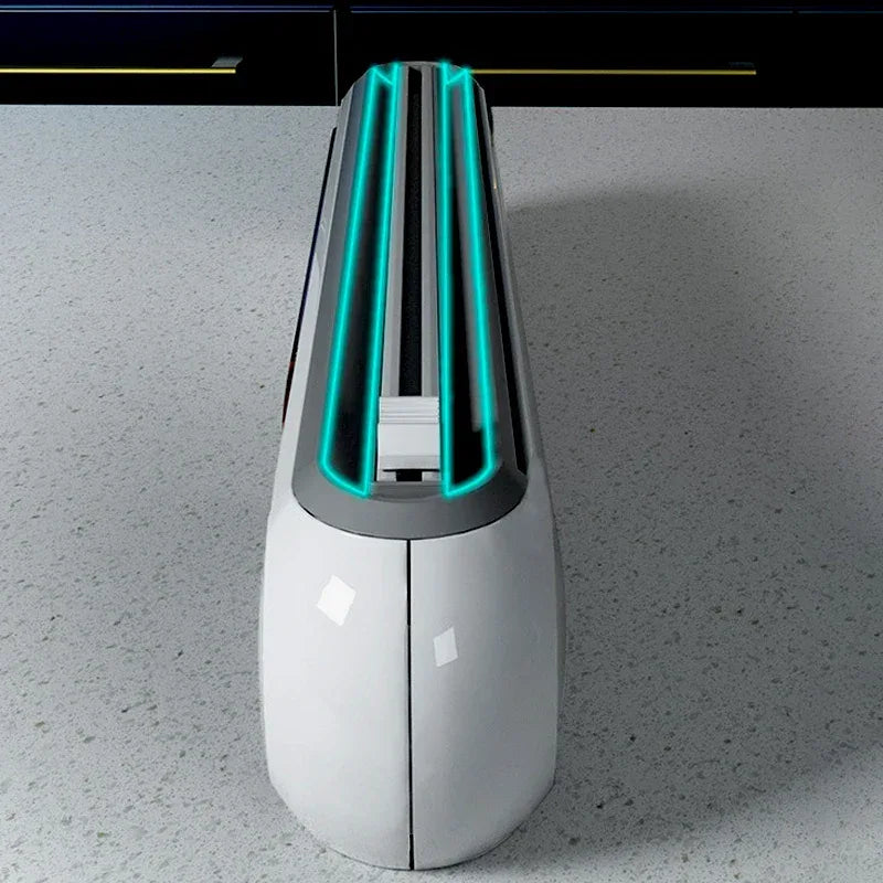 Aluminum plastic wrap dispenser attached magnetically to refrigerator door