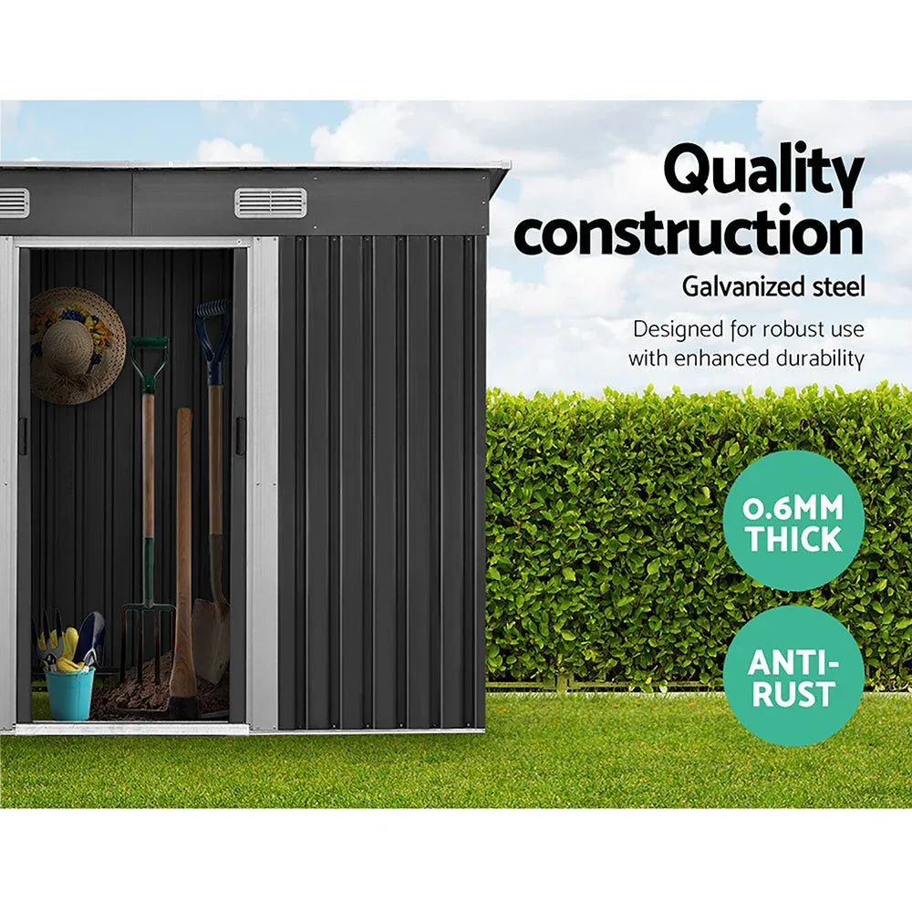 Garden shed door open revealing roomy interior suitable for tool storage and workshop use.