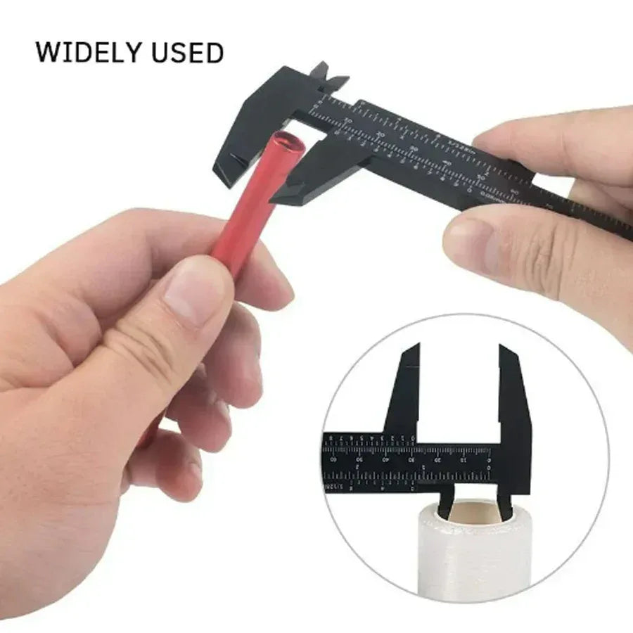 Vernier caliper measuring small object, highlighting its precise sliding scale.