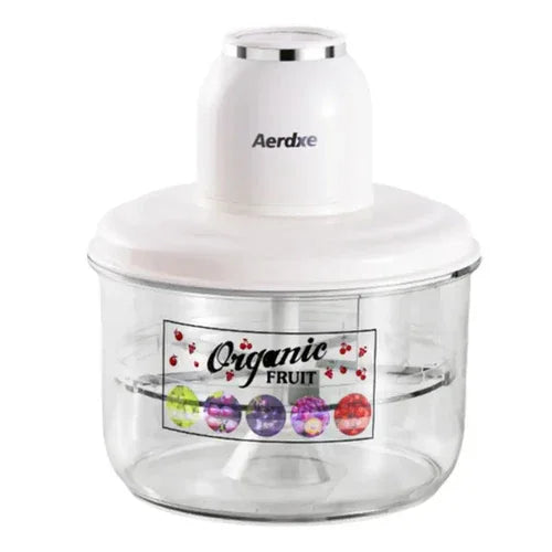 Electric automatic peeler with peeled grapes and kitchen utensils in backdrop.