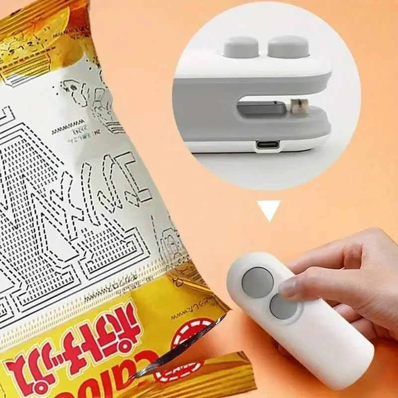 Close-up of the white mini sealer device with Type-C charging port visible.