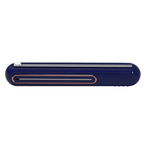 Dispenser on metal surface with foil partially pulled out for easy cutting