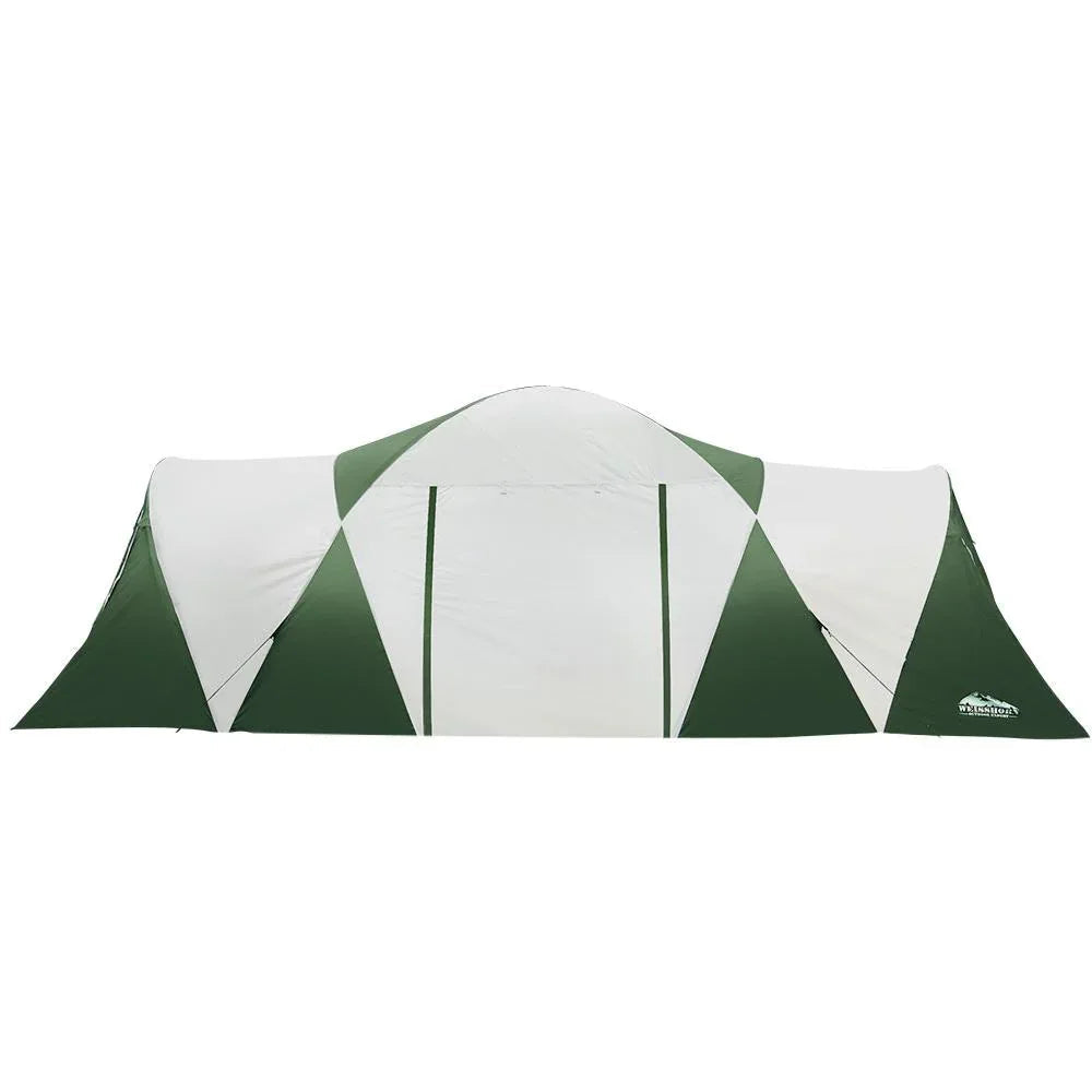 Weisshorn camping tent pitched on a beach with ocean in background and mesh windows visible.