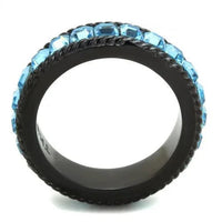 Ring displayed flat showing smooth black ion plating and sparkling sea blue crystal in center.