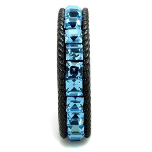 Top view of black ion plated stainless steel ring highlighting sea blue crystal and polished finish.