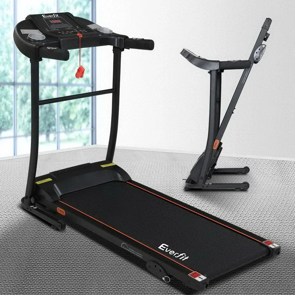 Electric treadmill positioned in a bright room with fitness accessories nearby.