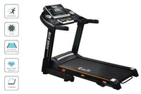 Treadmill folded vertically to save space in a compact home environment