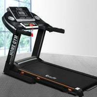 Close-up of treadmill running belt texture and steel frame detail