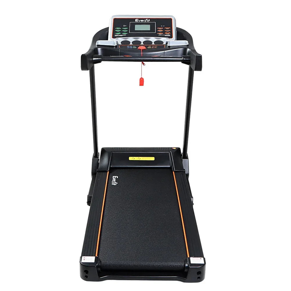 User walking on compact Everfit Electric Treadmill in home setting