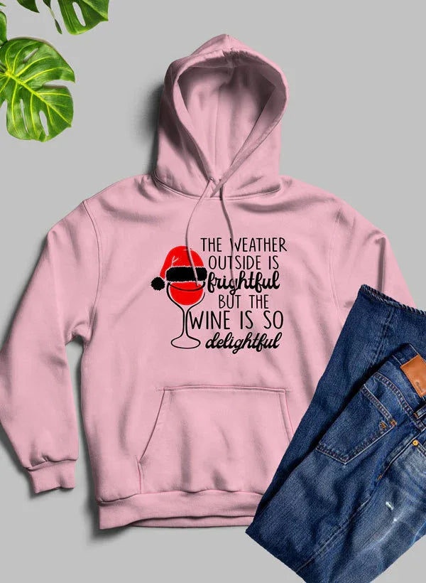 Black hoodie displayed flat showing winter-themed graphic and text on front with adjustable hood.