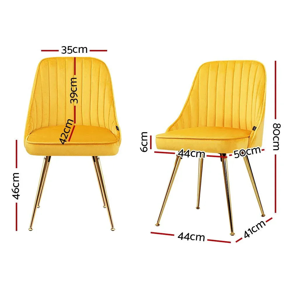 Side view of Artiss dining chair showing velvet upholstery and curved scallop shell back design.