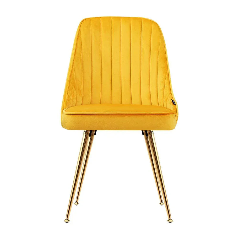 Close-up of thick padded velvet seat and smooth, scalloped backrest of Artiss dining chair.