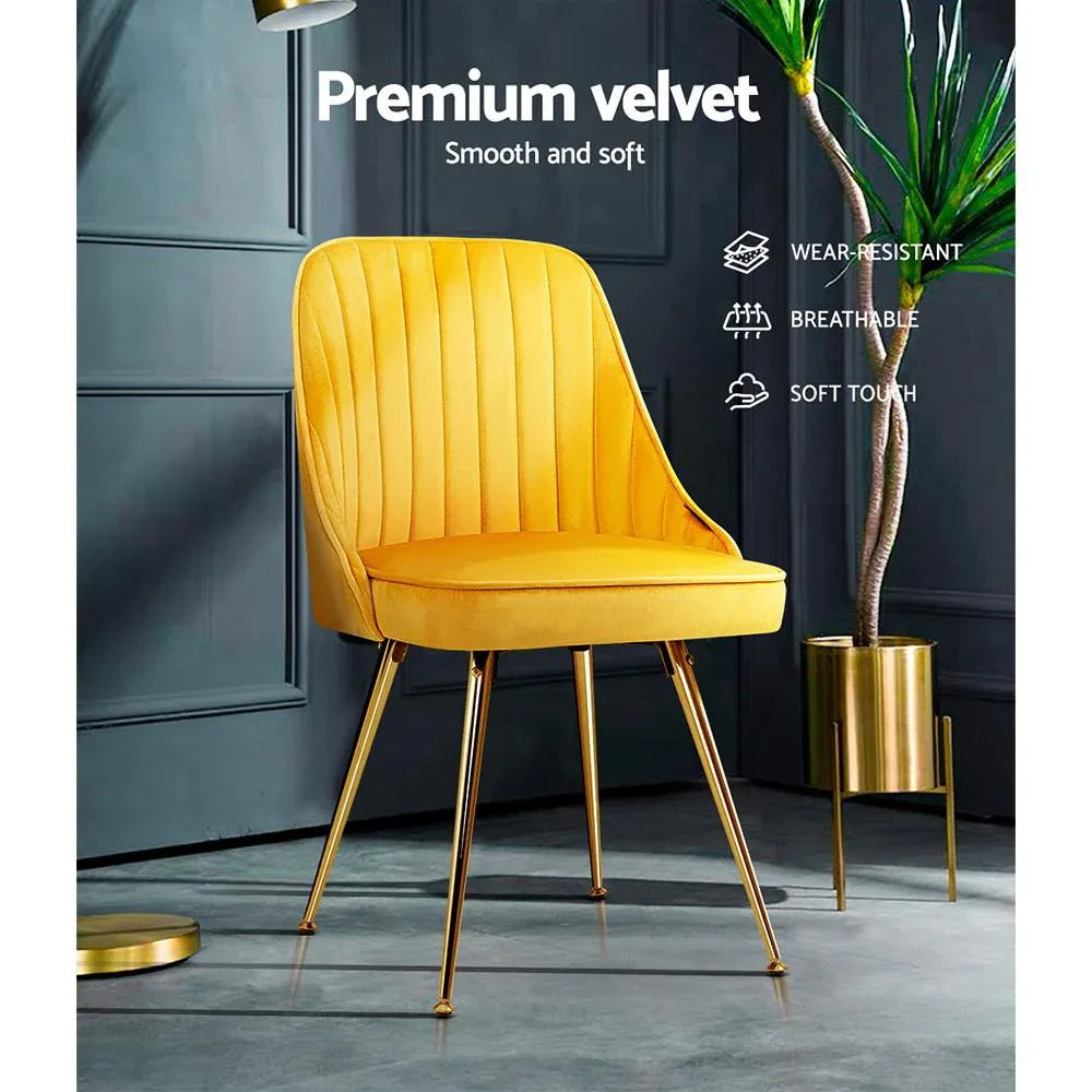 Artiss retro dining chair angled to display fluid curves and plush velvet fabric.