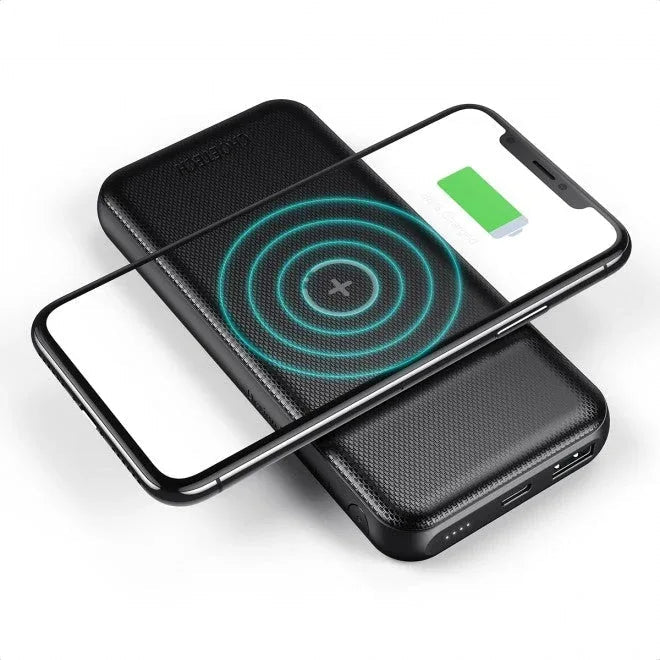 Black Choetech B650-CC power bank with wireless charging pad angled on white background.
