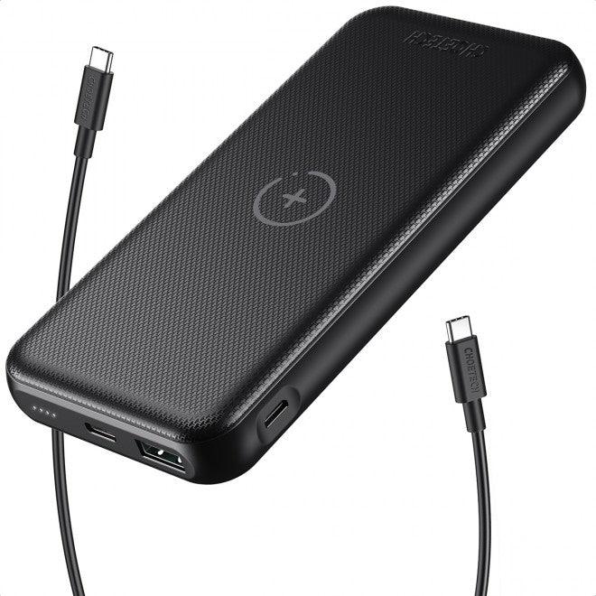 Close-up of the black power bank displaying its USB-C and charging ports.