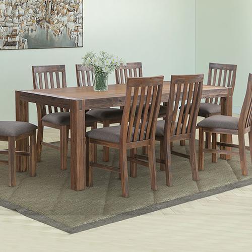 Large 210cm dining table with solid acacia wood base and simple metal design on the sides in a modern dining room setting.
