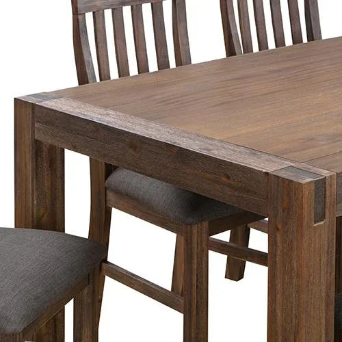 Close-up view of dining table's solid acacia wood base and brushed metal wire frame detail under natural light.