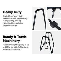 Rear angle of black steel parallette stand used for dips and push-ups at home gym.