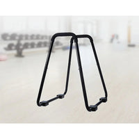 Side view of sturdy parallette stand with parallel bars and fitness suspension straps.