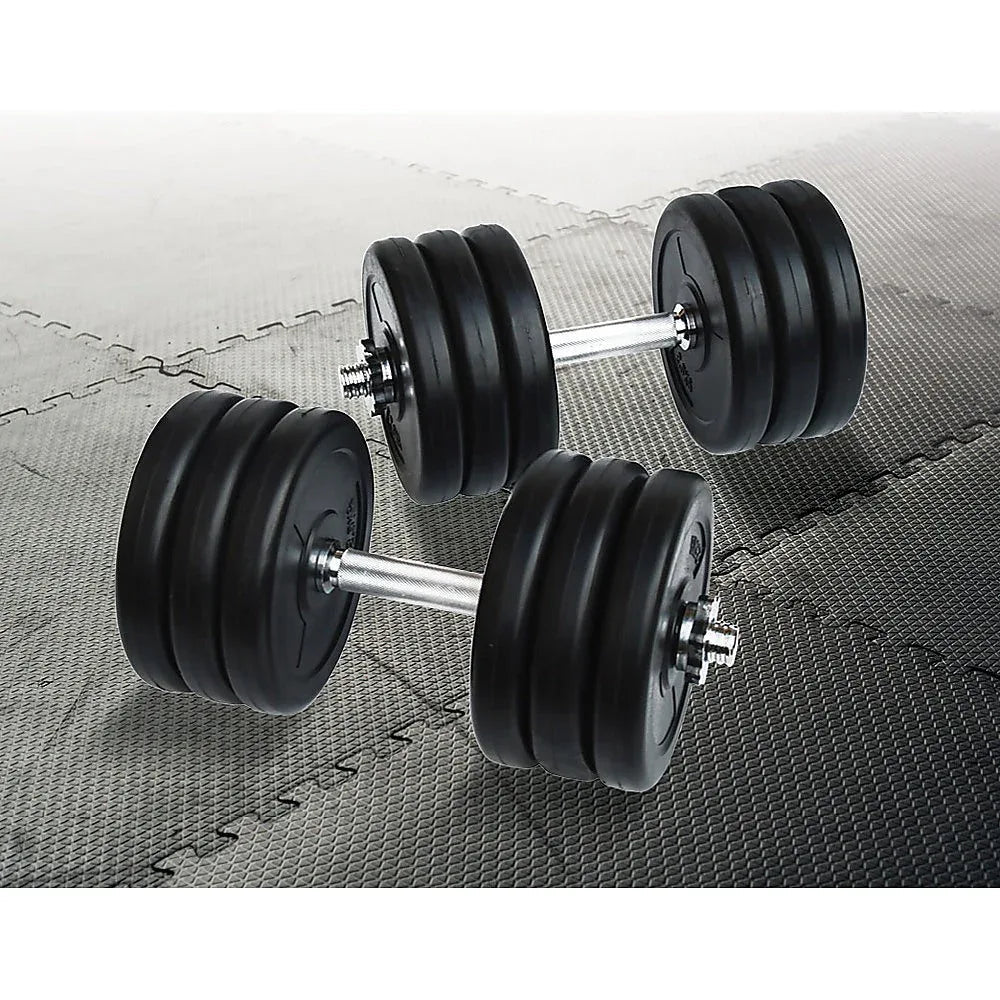 Close-up of adjustable dumbbell showing metal handle and black weight plates stacked.