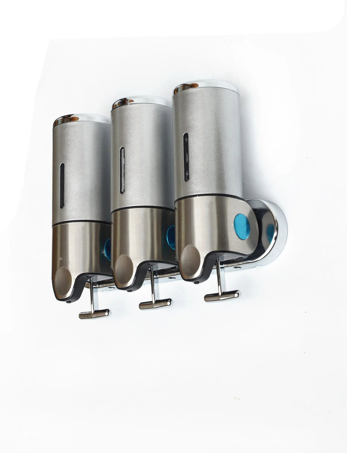 Close-up of the shower dispenser showing three refillable containers labeled for shampoo, conditioner, and body gel.
