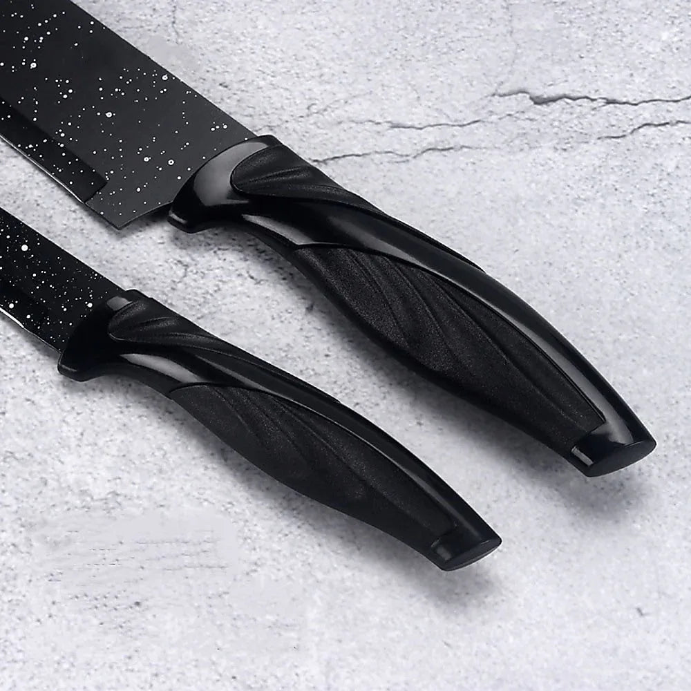 Sharpener tool placed beside kitchen knives highlighting maintenance tools in the set.