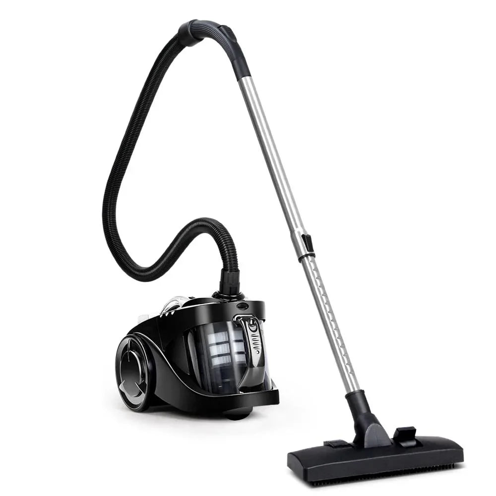 Vacuum cleaner viewed from top showing power button and handle design