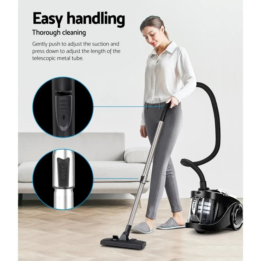 Vacuum cleaner dust container being removed with release button