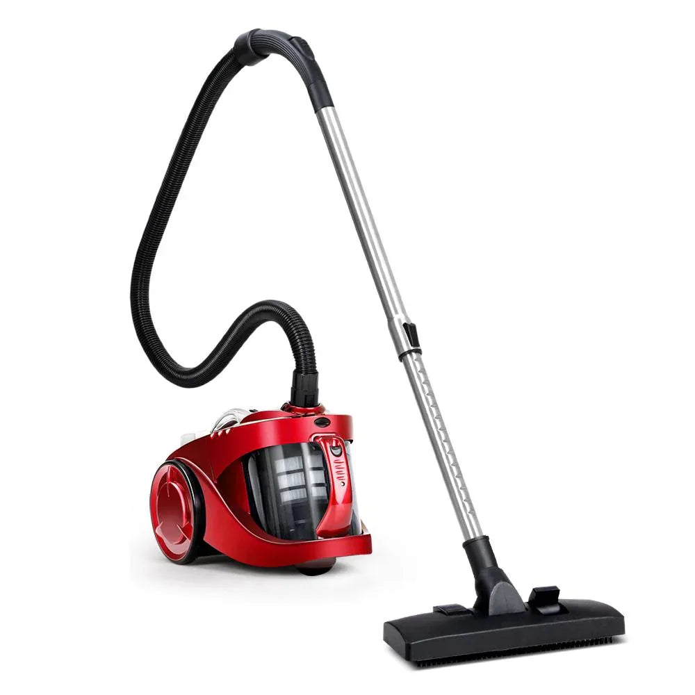 Vacuum cleaner with detachable dust container placed on a white surface