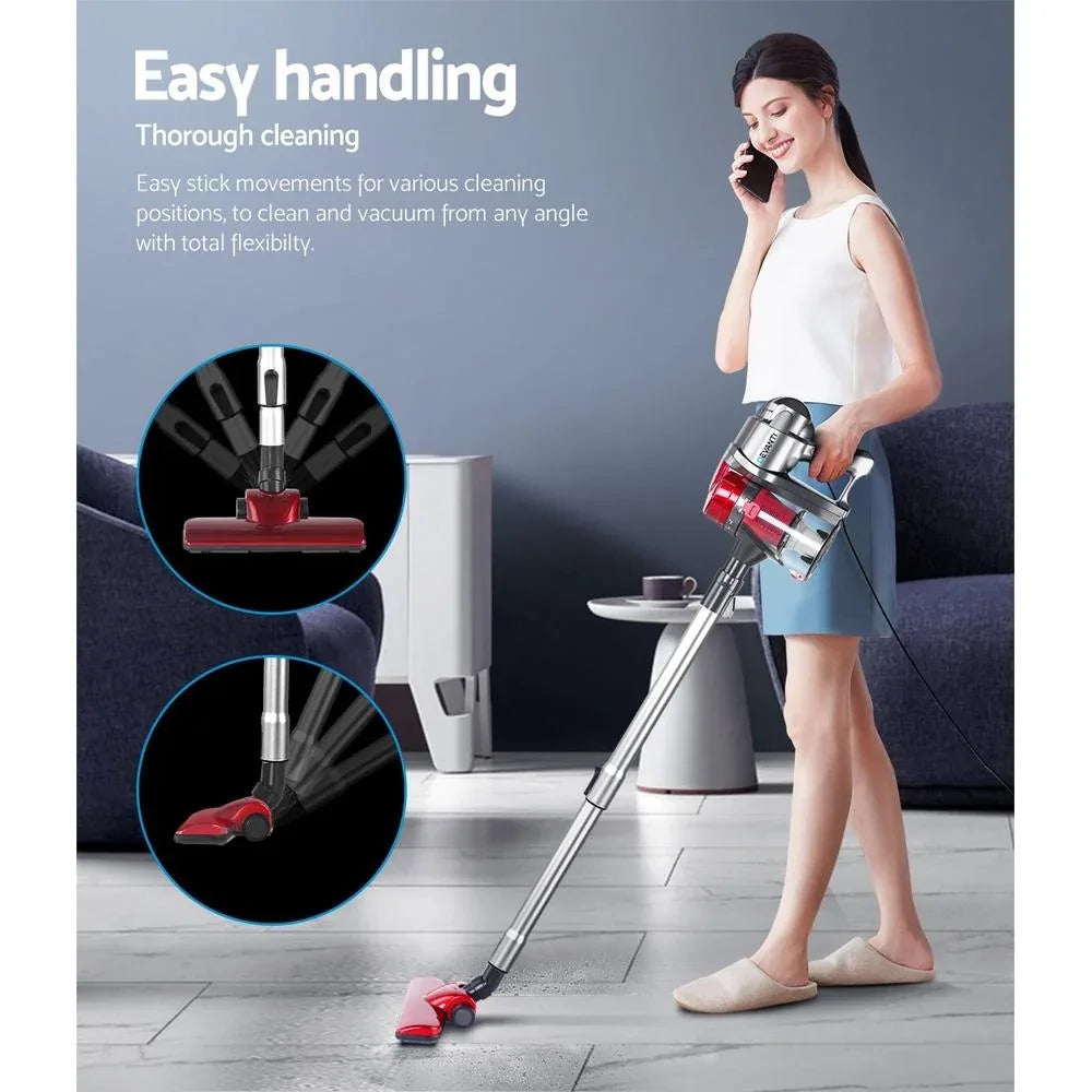 Red and silver Devanti vacuum cleaner with cord coiled beside appliance on light floor.