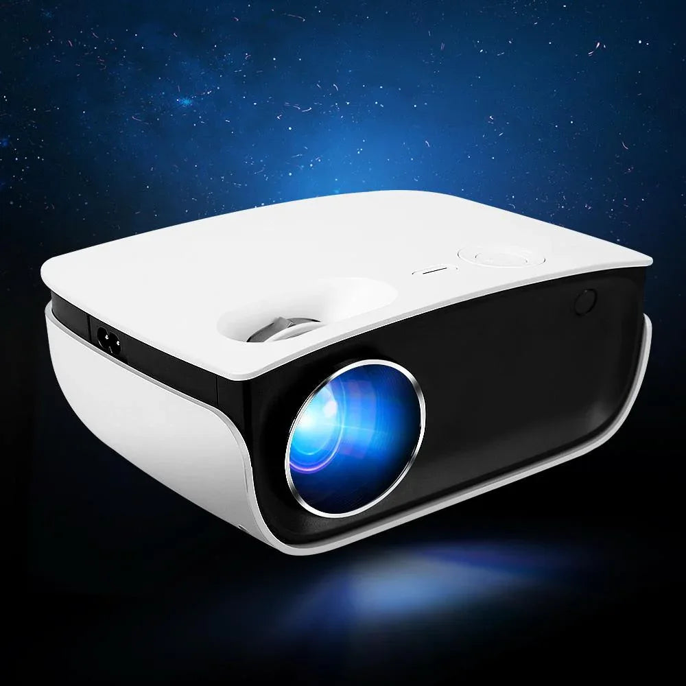 Carton box packaging of Devanti Mini Video Projector showing product name and images.
