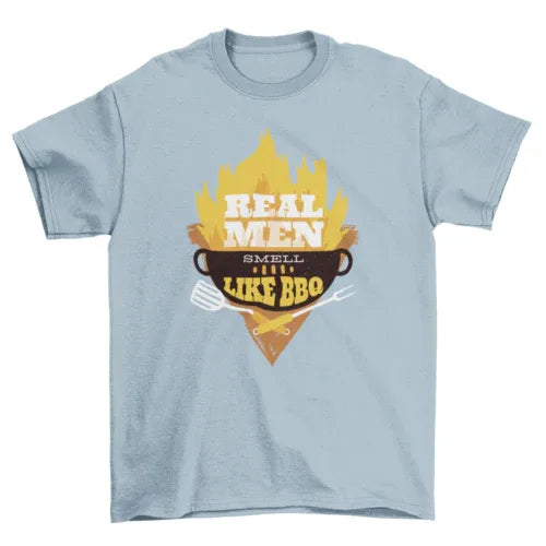 Close-up of front of black T-shirt showing BBQ grill with flames and bold white lettering.