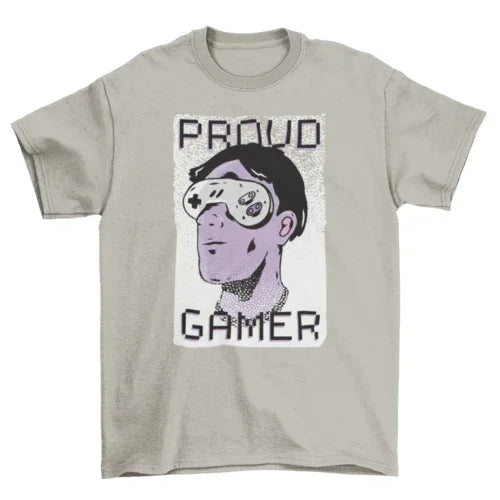 Flat lay of Proud Gamer T-shirt with illustrated man wearing console controller sunglasses and text