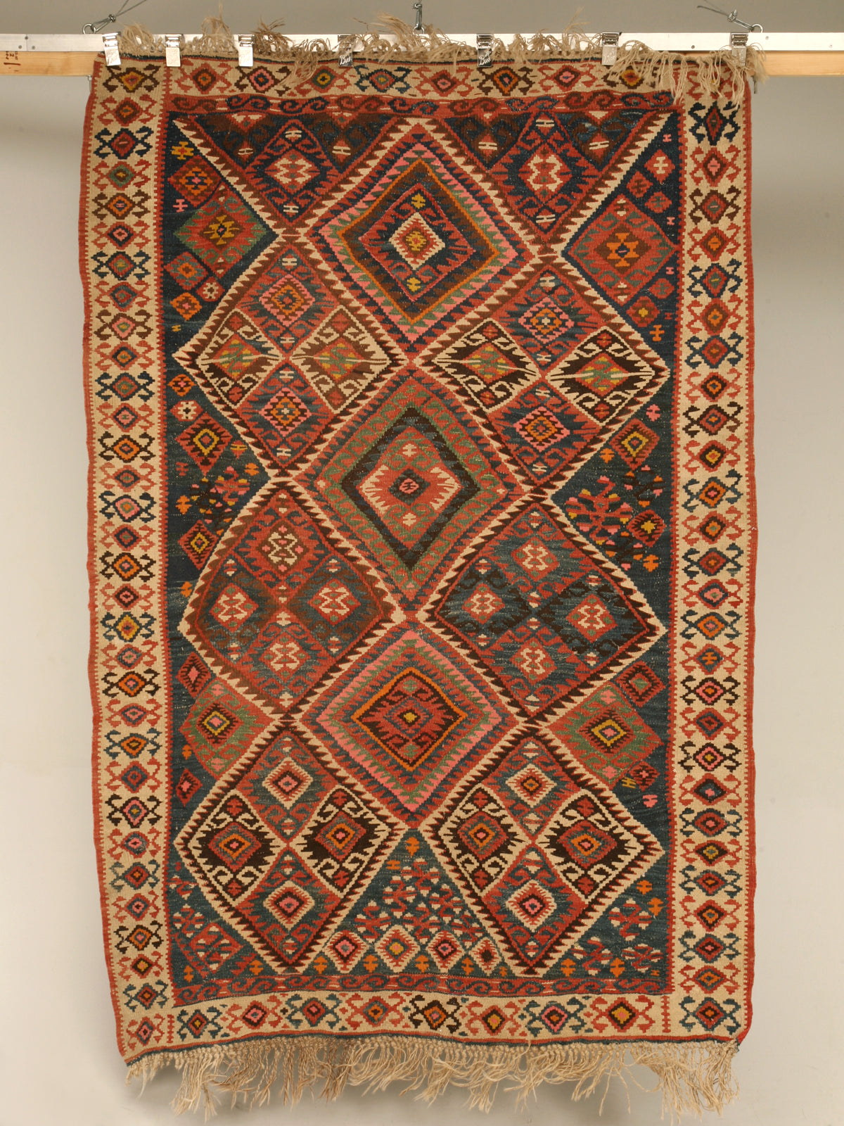 Handwoven kilim texture — representative example (photo: Cllane4, Wikimedia Commons, CC BY-SA)