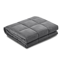 Close-up of soft microfibre cover on 7KG weighted blanket folded on bed.