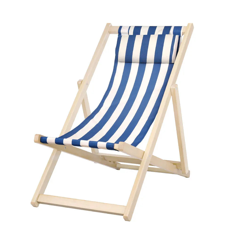 Blue and white striped folding beach chair with wooden frame on white background