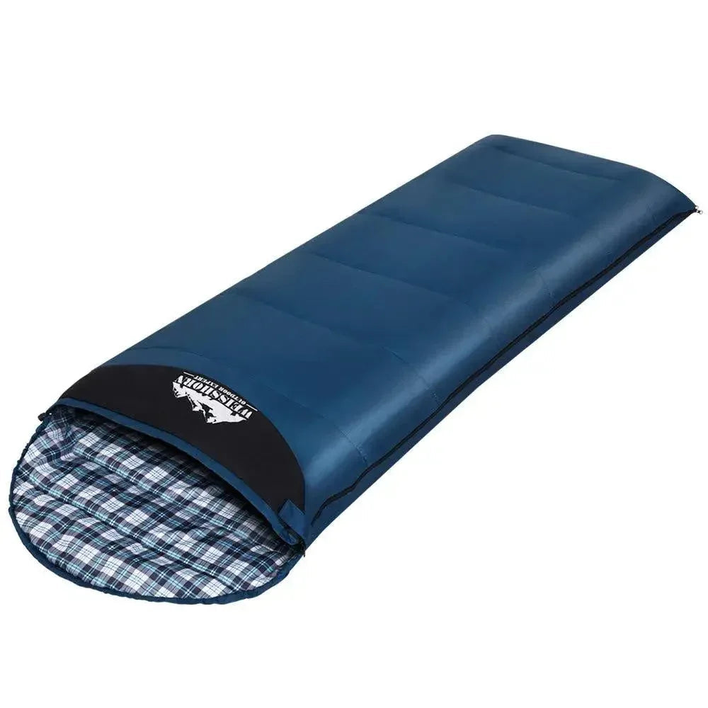 Compact Weisshorn sleeping bag rolled up with orange and black colors on white background.