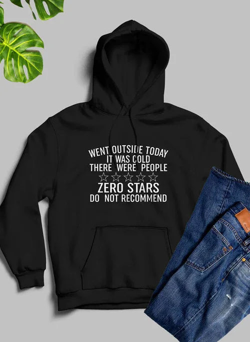 Close-up of the 'Went Outside Today' text printed in bold on a white hoodie.