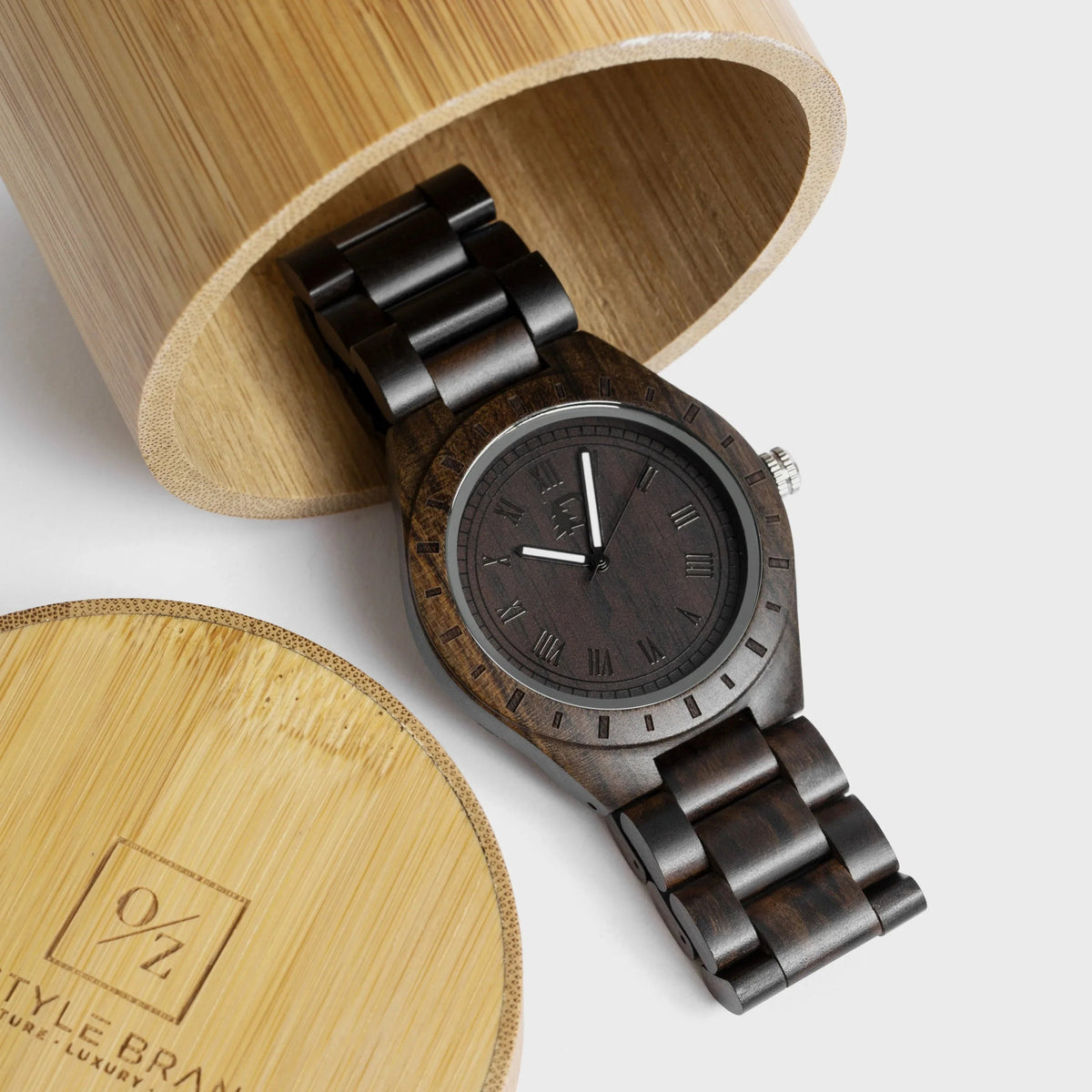 Men's stylish wood watch showing wooden bezel and stainless steel buckle on leather strap.