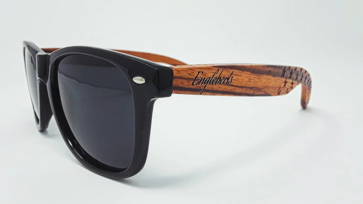 Pair of Zebrawood sunglasses displayed side by side on a white surface.