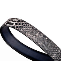 Close-up showing detailed python skin scales on the ARKANSAS belt with engraved western-style buckle.