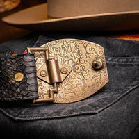 Lifestyle image of Arkansas black belt worn with casual shirt, highlighting belt buckle front view