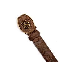 Brown python skin belt laid flat showing texture and brass buckle details