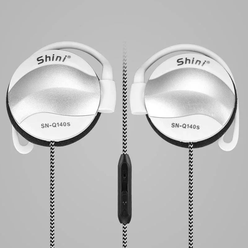 Close-up of black mobile ear hook headset showing ear hook and inline microphone.