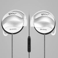 Close-up of black mobile ear hook headset showing ear hook and inline microphone.