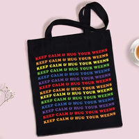 Keep Calm Wiener Dog Tote bag with red straps laid flat highlighting bright dog print on fabric.