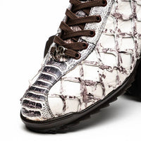 Top view of Batistini sneaker showing silver-tone hardware on tongue and detailed leather textures.