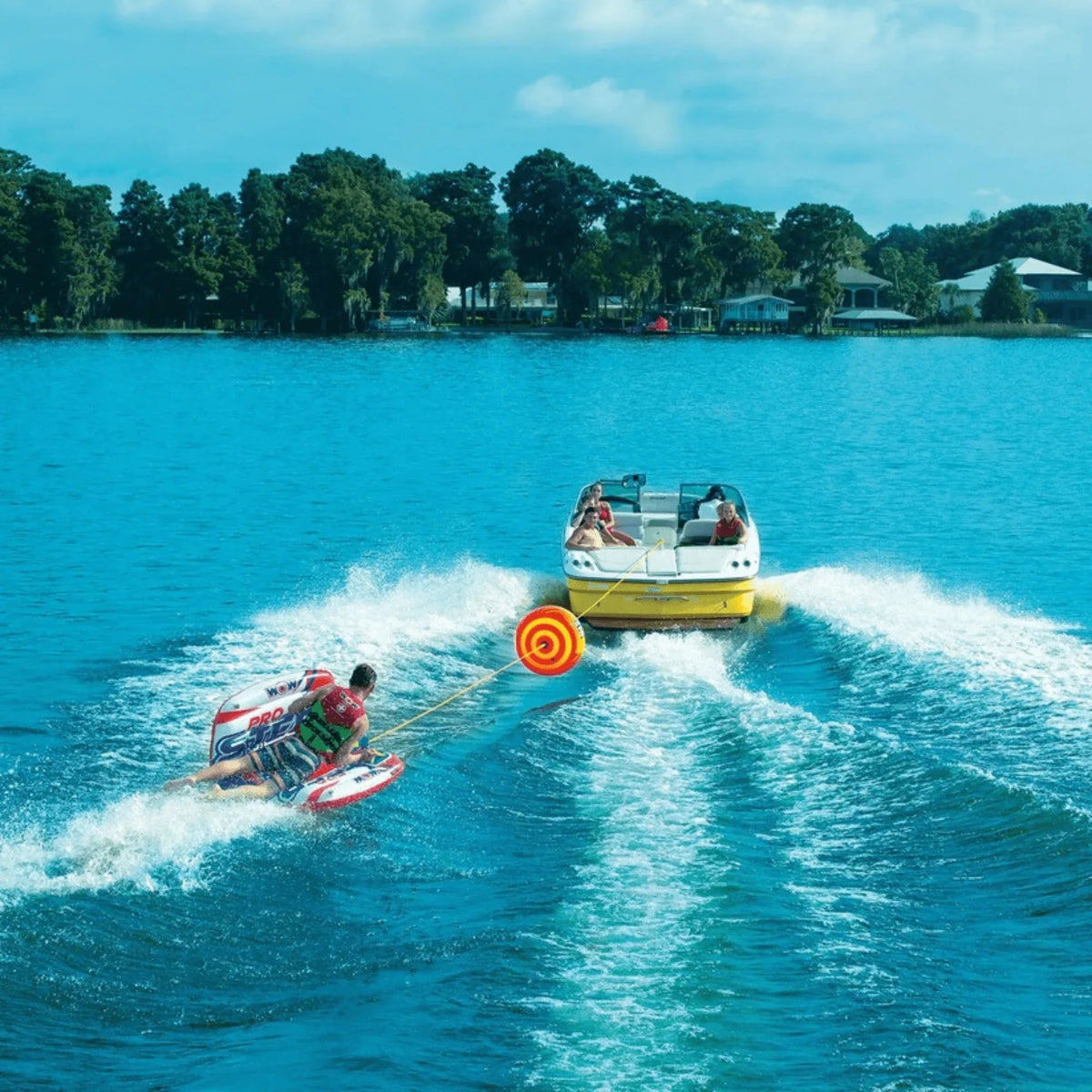 Graphic depicting water wake and rope behavior improved by using WOW Watersports Tow Turbo tow bobber.